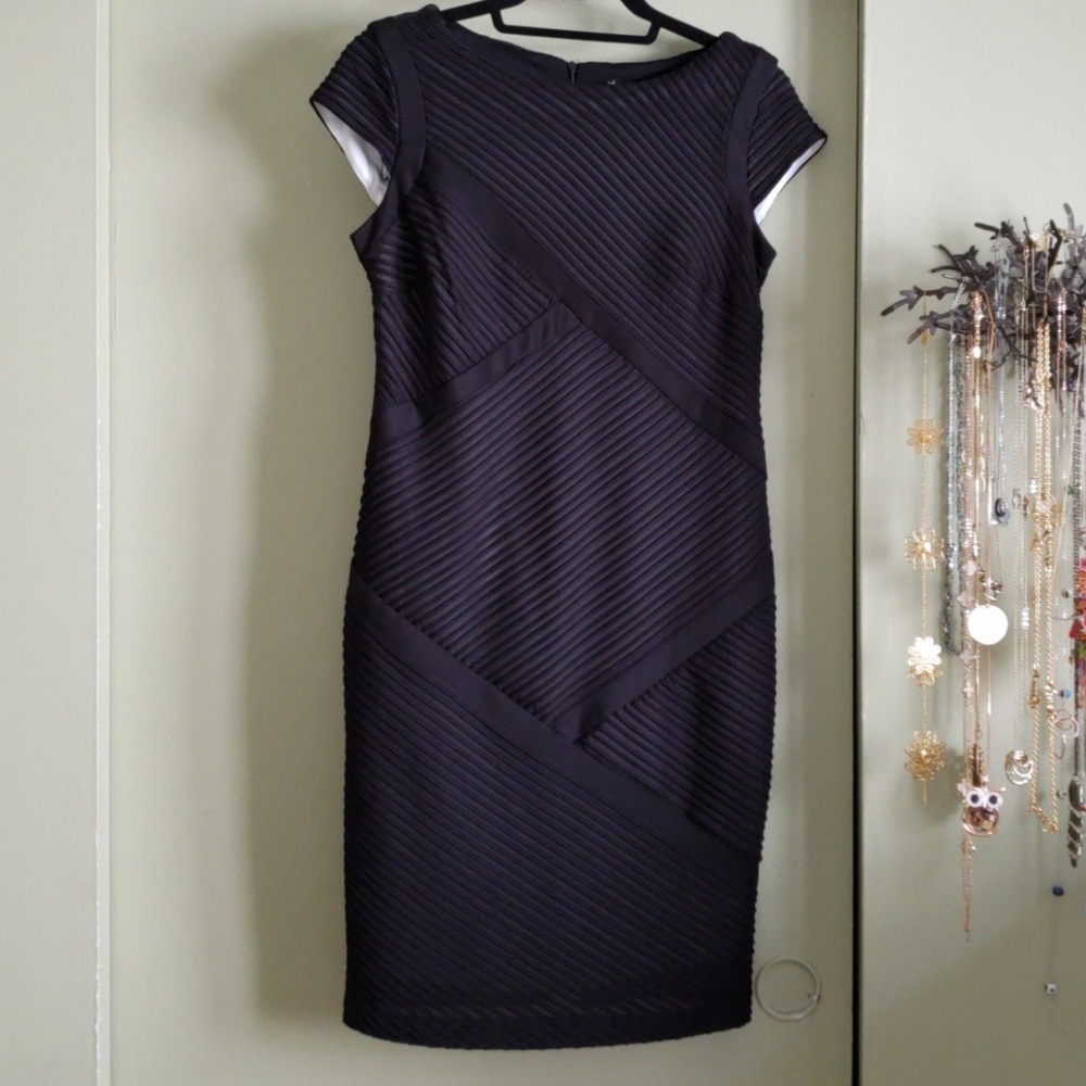 Elegant sheer black on white lined dress